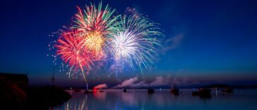 green, red, and white fireworks on sky at nighttime